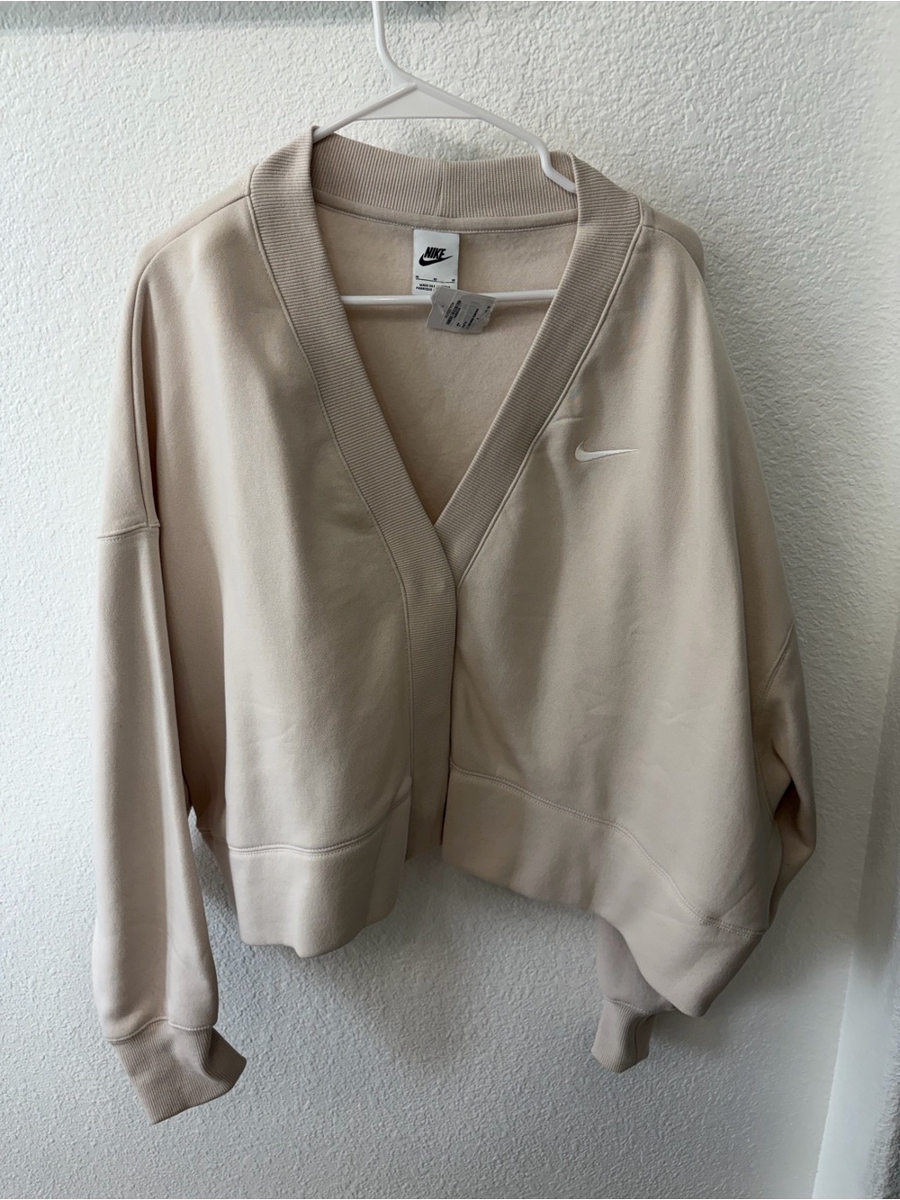 Nike Women's Light Cream Cropped Bomber Jacket
